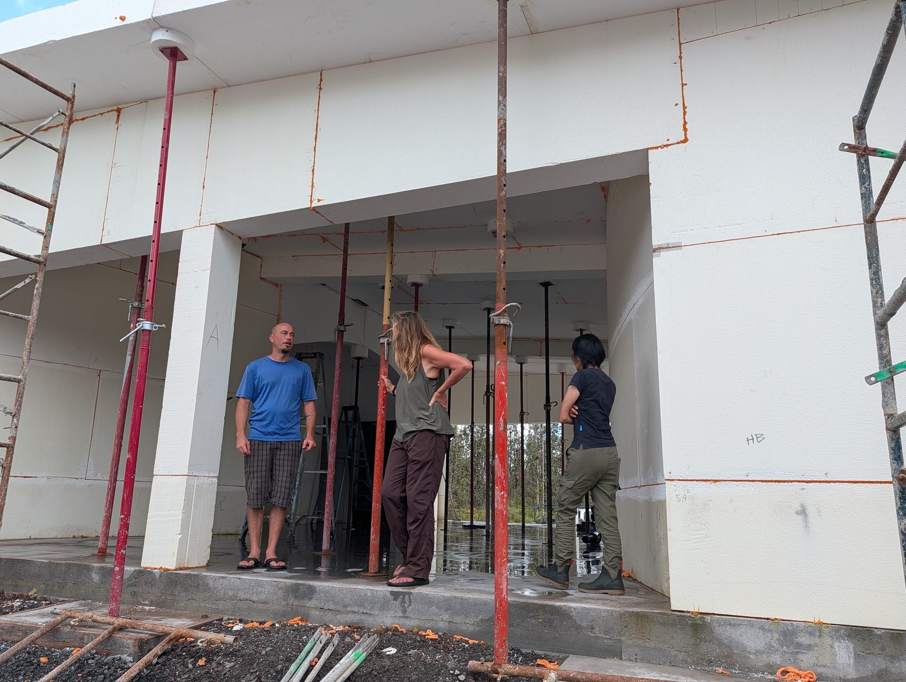 Volunteers inside the SABS structure at the door opening