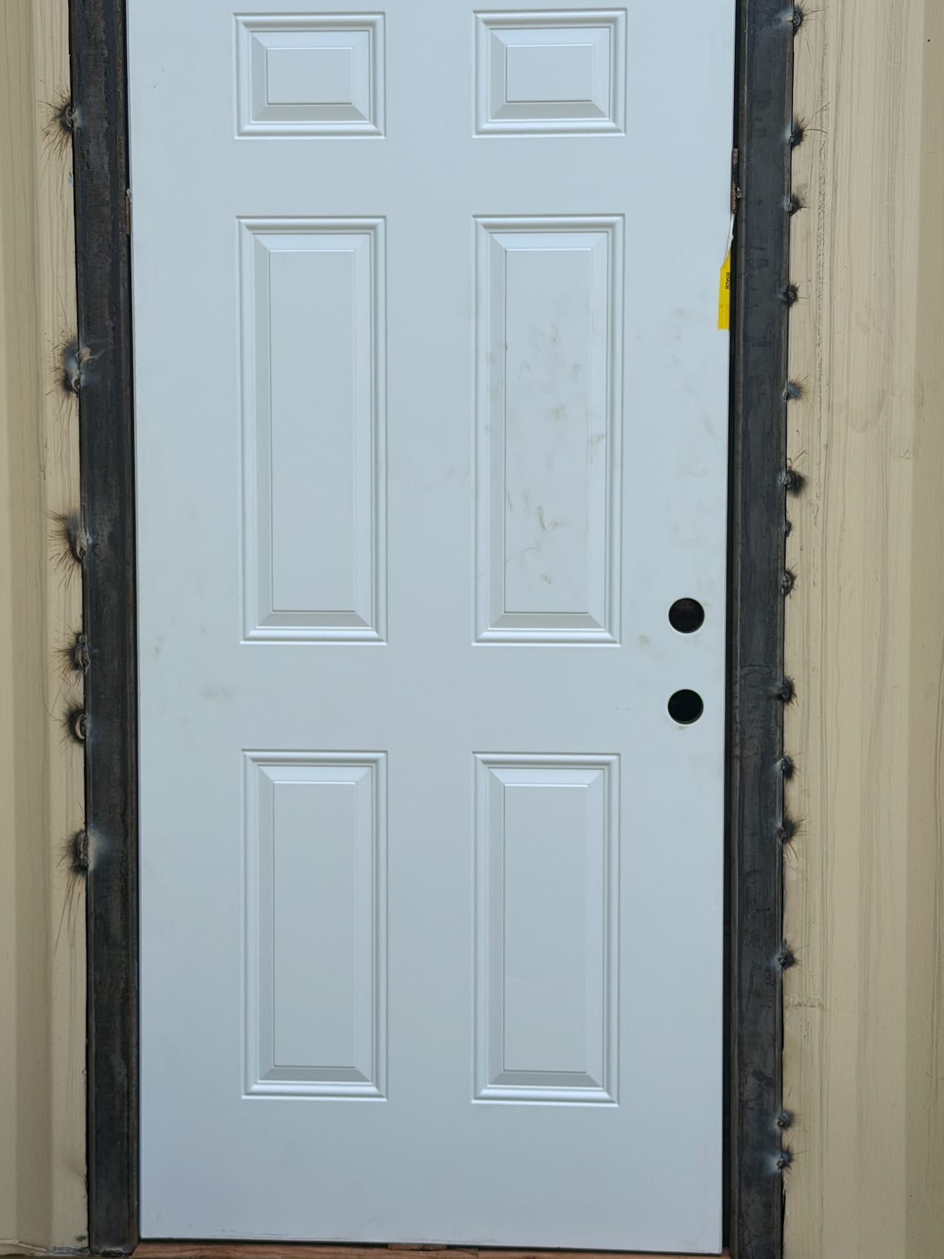 Close view of a fitted door and weather seal