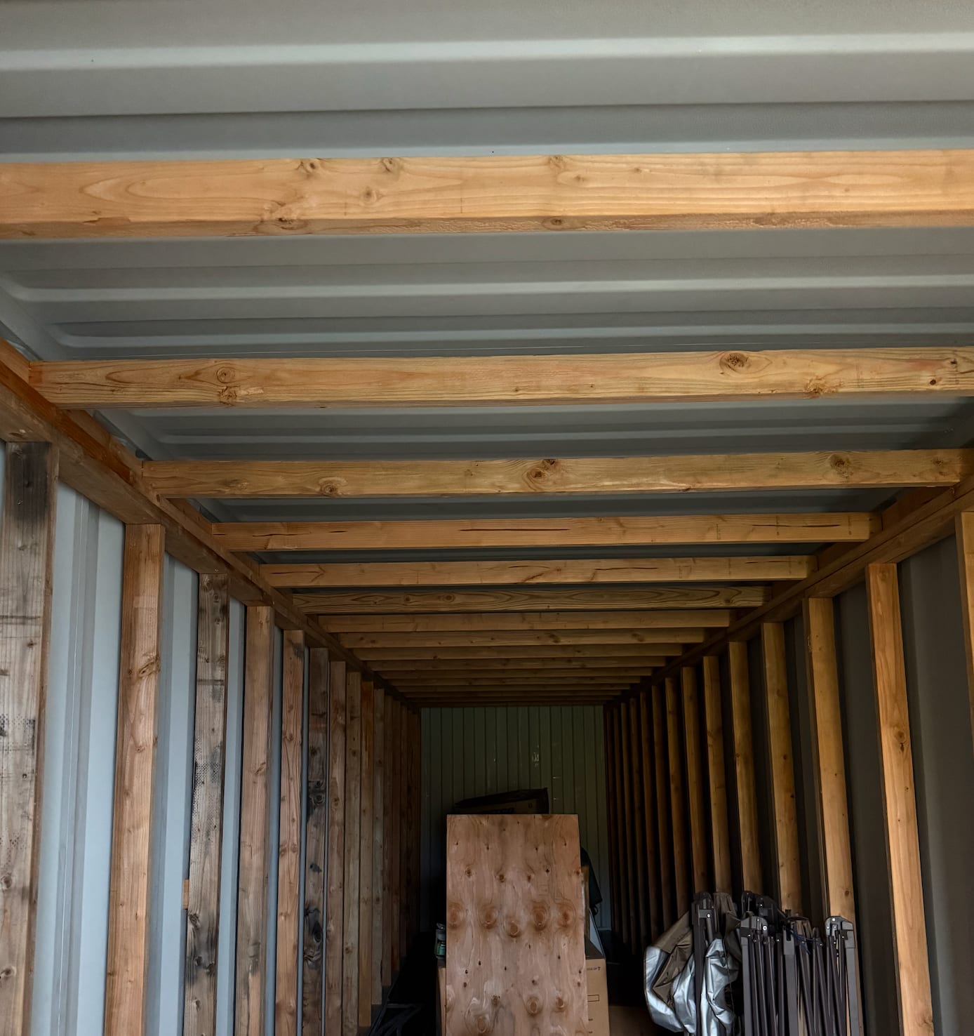 Interior of the container, framed out along its length