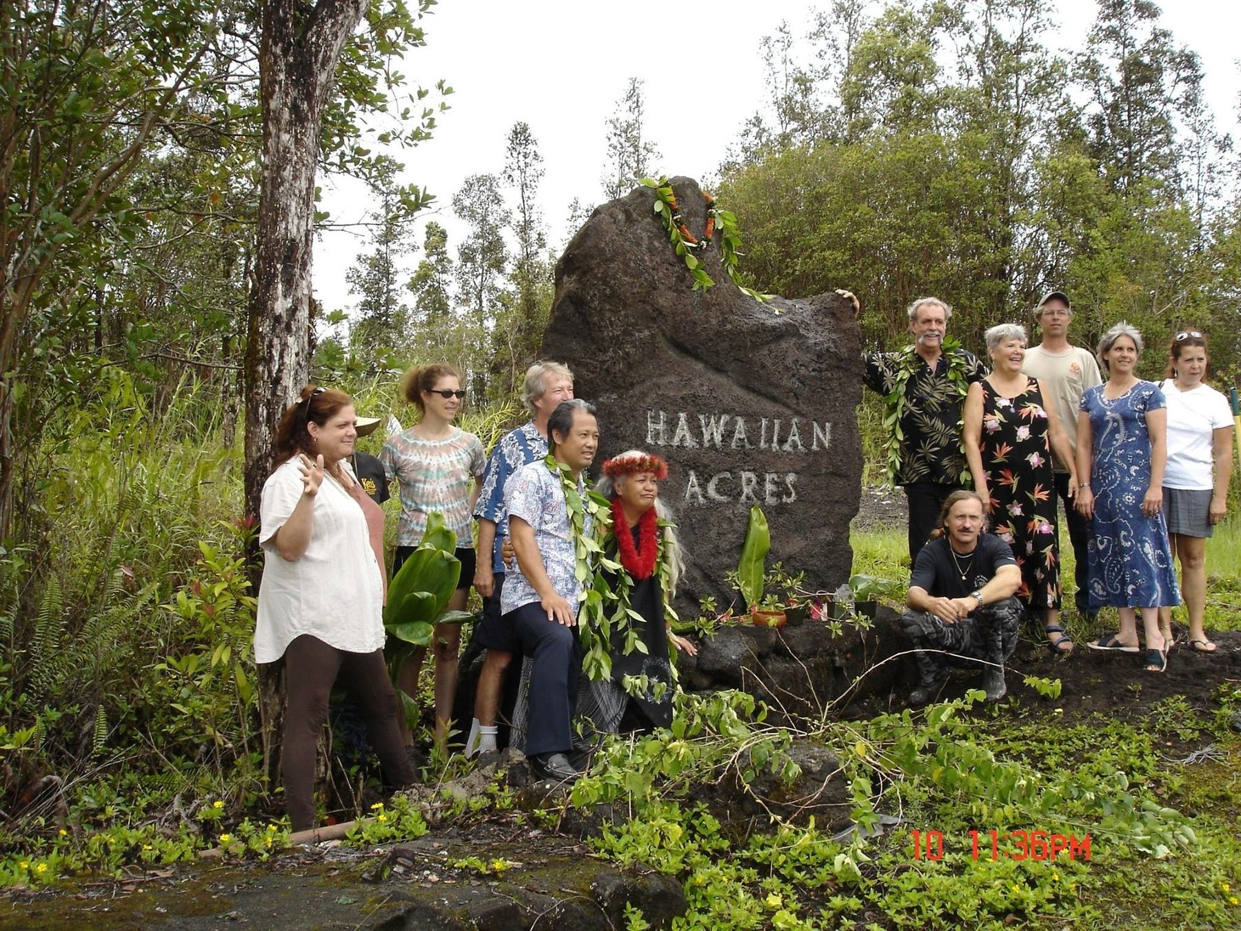Neighbours gathered at the reinstalled Hawaiian Acres entrance pōhaku